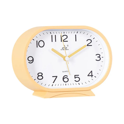 Oval og lydløs analog vekkerklokke