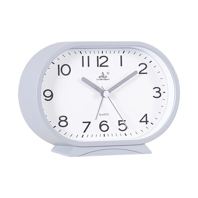 Oval og lydløs analog vekkerklokke