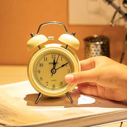 Beige retro vekkerklokke med bjeller