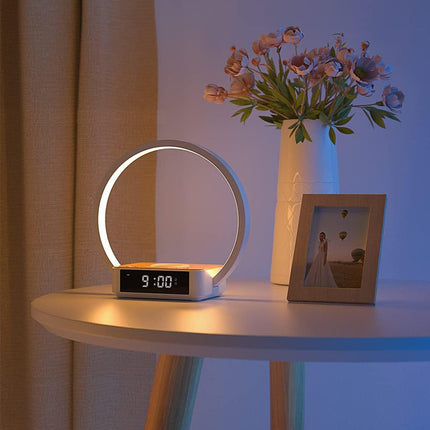 Lampe med klokke og trådløs lader