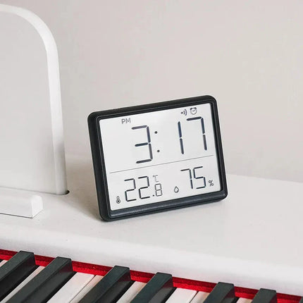 Kompakt digital reisevekkerklokke med alarm