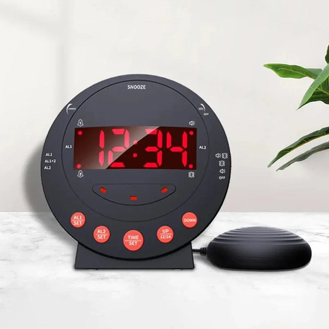 Svart vekkerklokke med vibrasjonspute