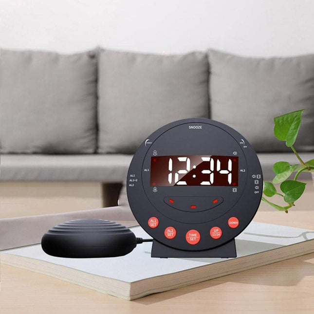 Svart vekkerklokke med vibrasjonspute