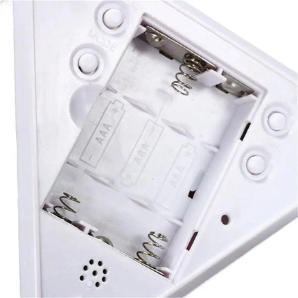 Pyramide vekkerklokke med stemningslys