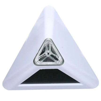 Pyramide vekkerklokke med stemningslys