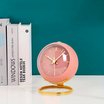 Rosa vintage vekkerklokke med gullstativ