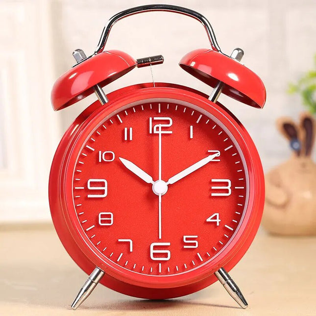 Rød vintage vekkerklokke med bjeller