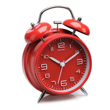 Rød vintage vekkerklokke med bjeller